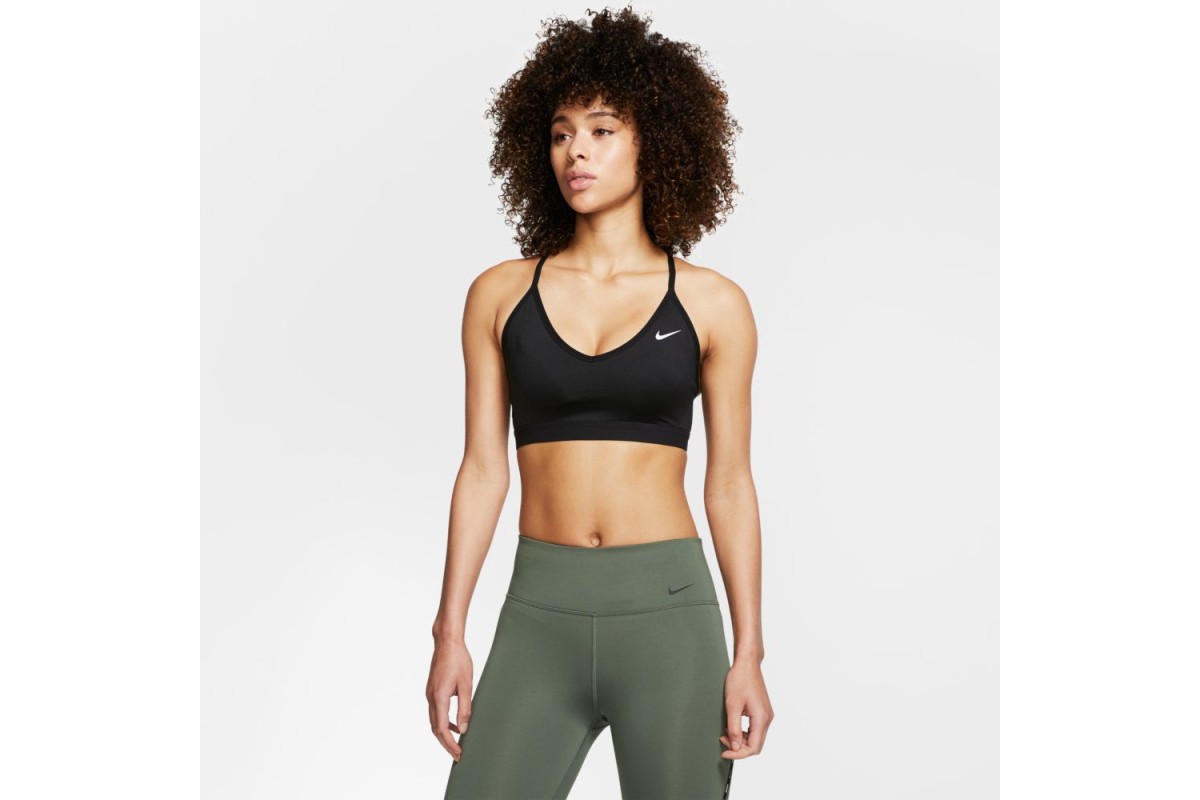 Women's Nike Indy Sports Bra offers light support during high-enegry workouts such as barre and yoga. The low-cut design and thin, adjustable straps provide feminine detail while the back mesh