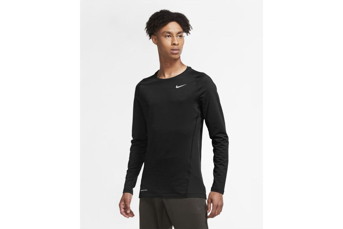 Ideal for wear on its own or layered under a kit, the Nike Pro Warm Top ...