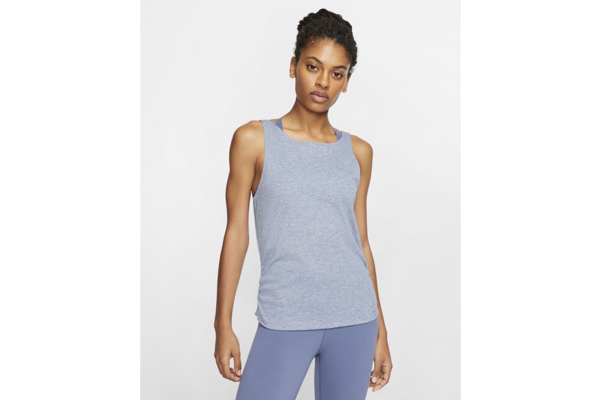 Nike Ruched Yoga Tank Diffused Blue / Heather / Obsidian Mist The Nike Yoga  Tank combines soft, ribbed fabric with sweat-wicking technology to keep you  dry and comfortable. There's a little bit